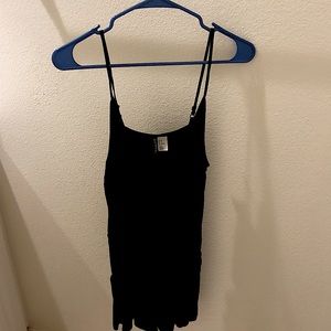 Divided black romper, size 8